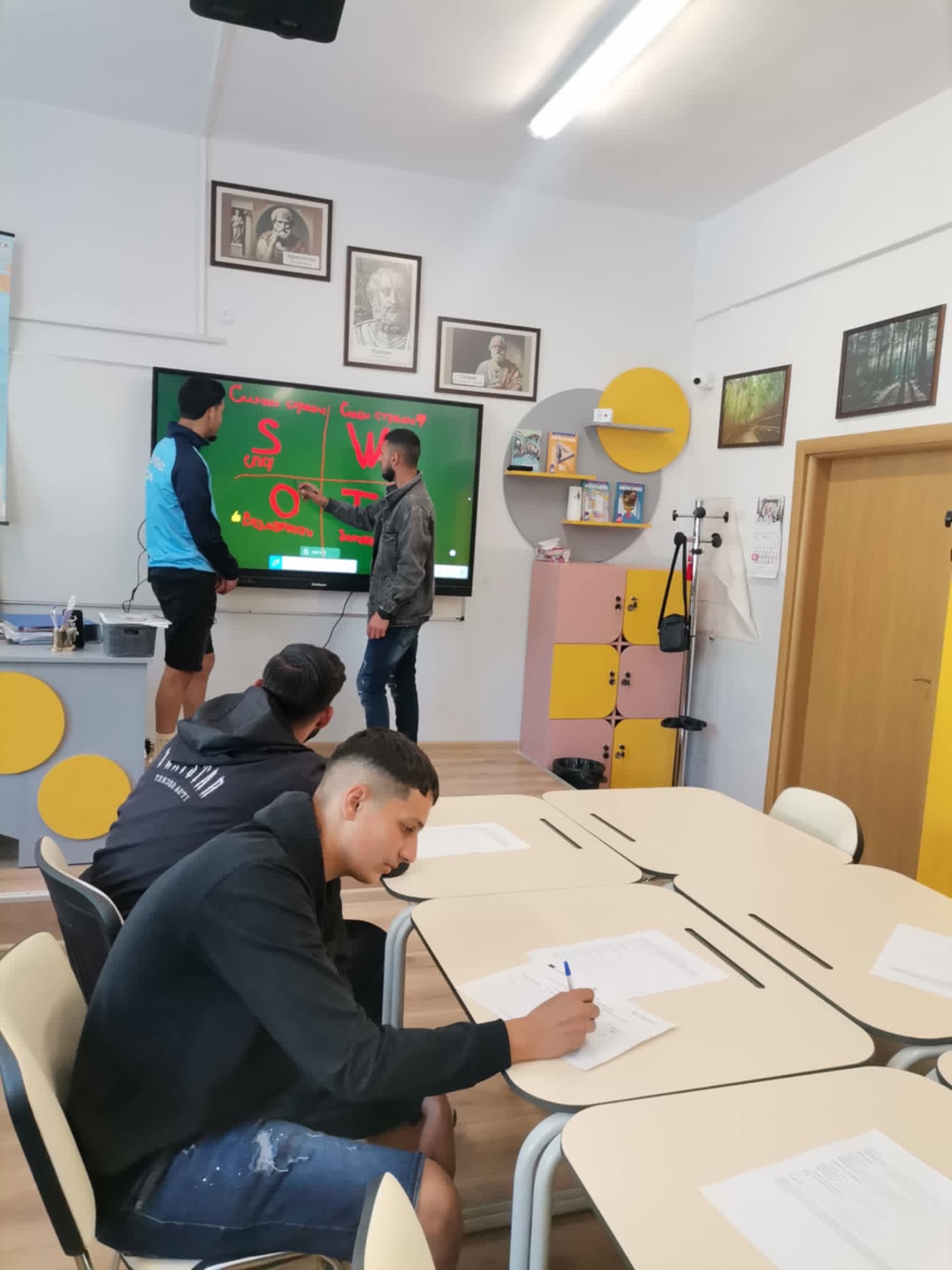Young people collaborating during a THRIVE digital skills workshop in Bulgaria