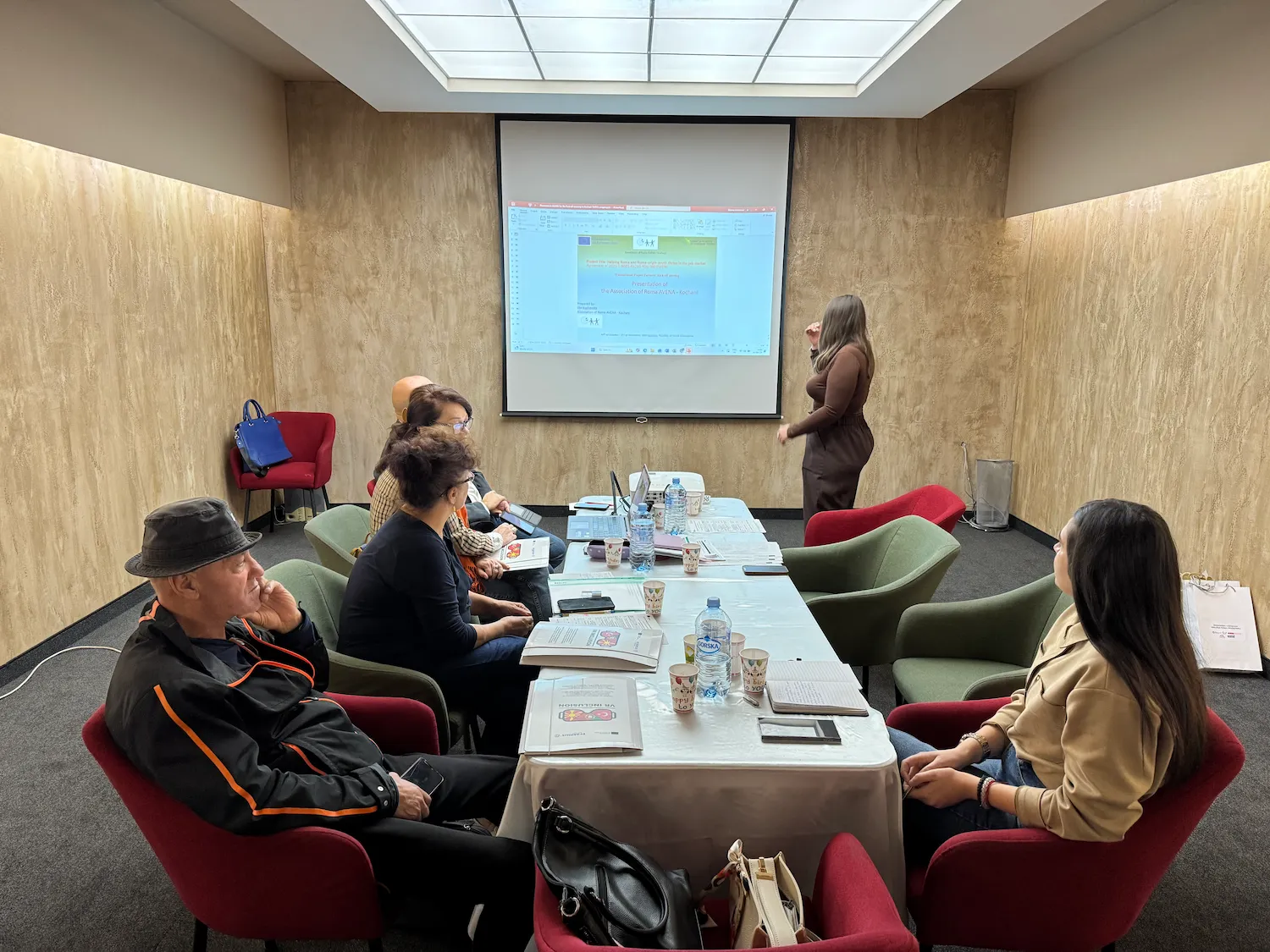 A representative of European Multicultural Association presenting to THRIVE project partners